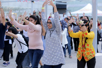 Students warming up at the Study Melbourne Welcome Party on March 23, 2018 in Melbourne, Australia. The students also participated in a Guinness World Record attempt for most nationalities in a dance party. (Photo by Wayne Taylor/Getty Images for Study Melbourne)
