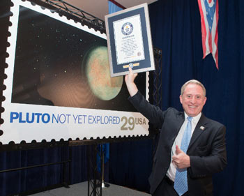 GUINNESS BOOK OF WORLD RECORDS™ ceremony for farthest distance traveled by a stamp. Dr. Alan Stern, Principal Investigator on New Horizons, Southwest Research Institute.